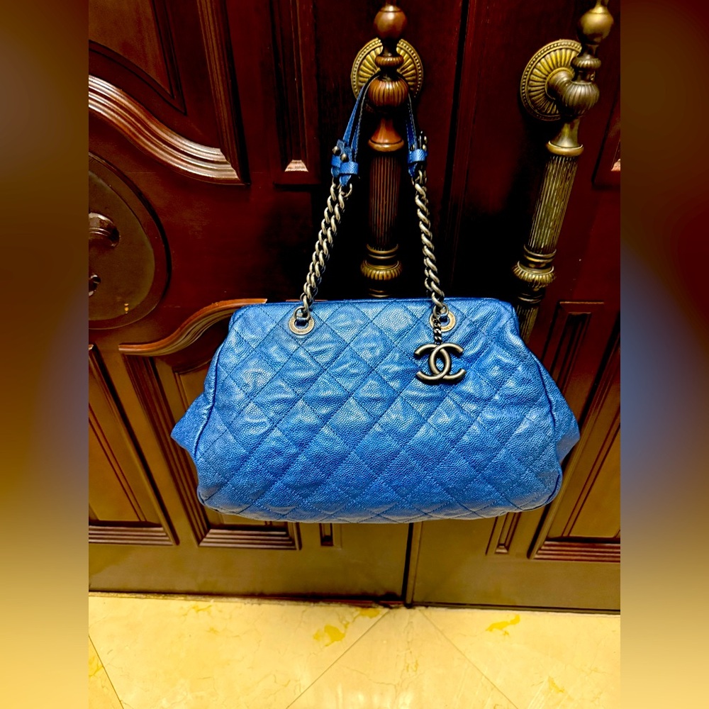 Chanel Metallic Blue Caviar Framed Bowling bag.
